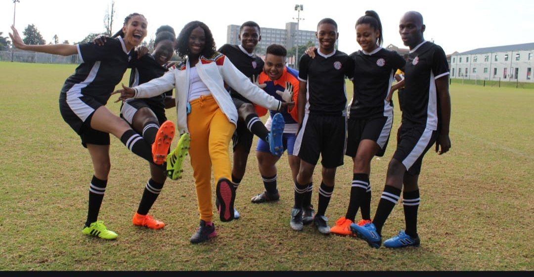 Soccer Season cast on the football field